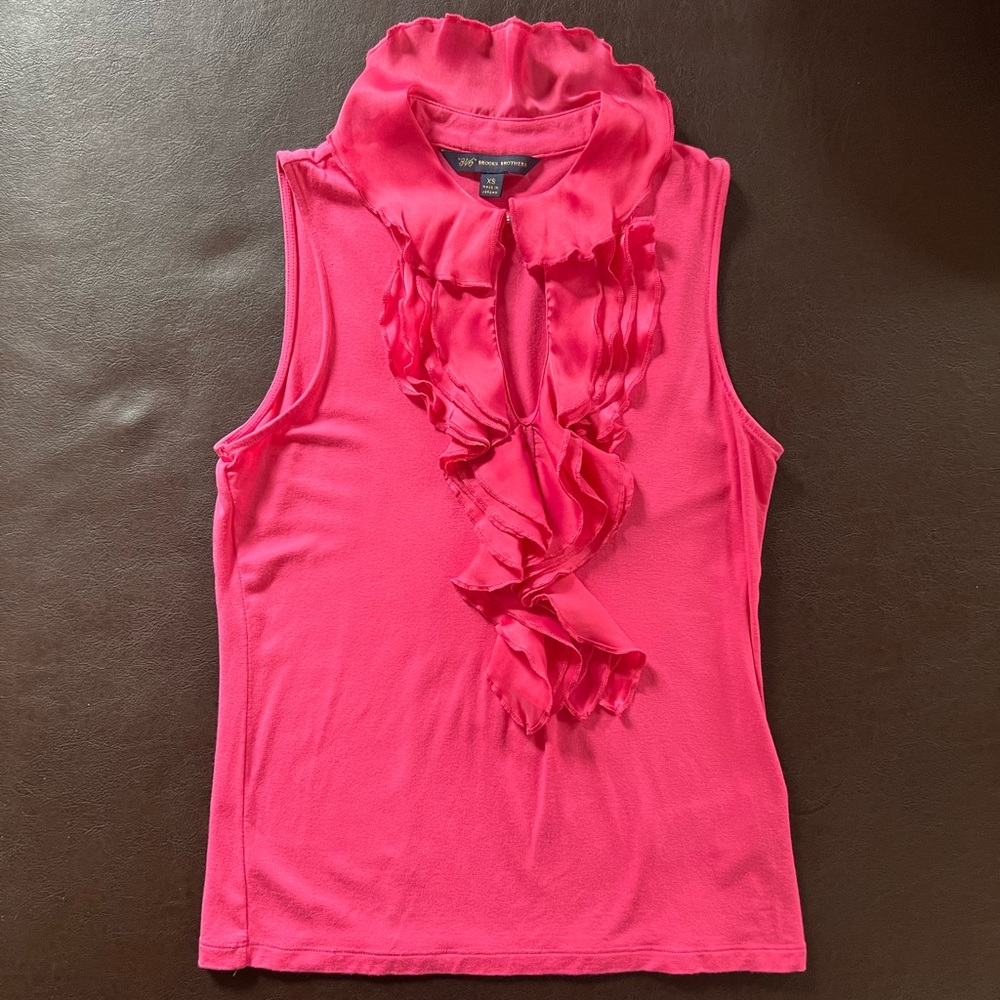 Ruffled sleeveless knit top